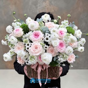Birthday flower basket in white and pink tones